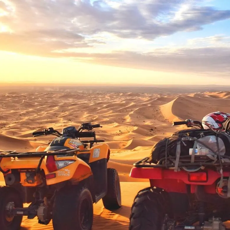 Quad al tramonto sulle dune di Merzouga